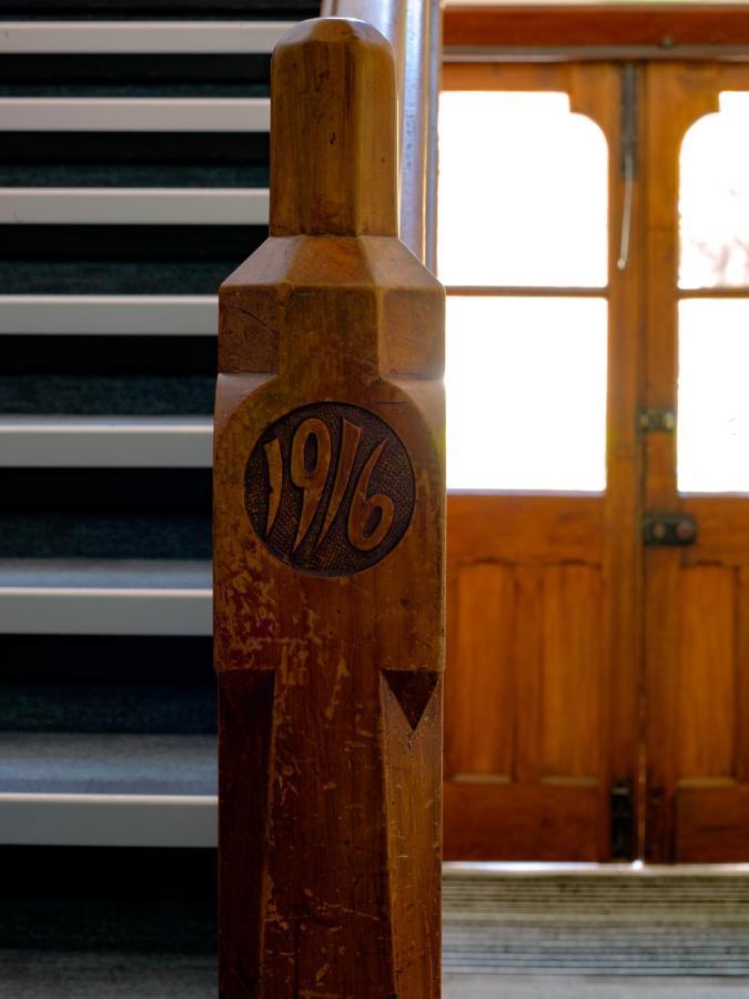 The Observatory Hotel Christchurch Exterior photo 1916 carved into a pillar