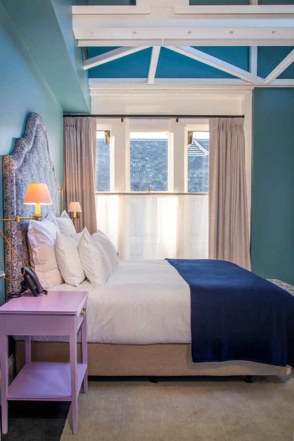 The Observatory Hotel Christchurch Exterior photo A bedroom at the hotel