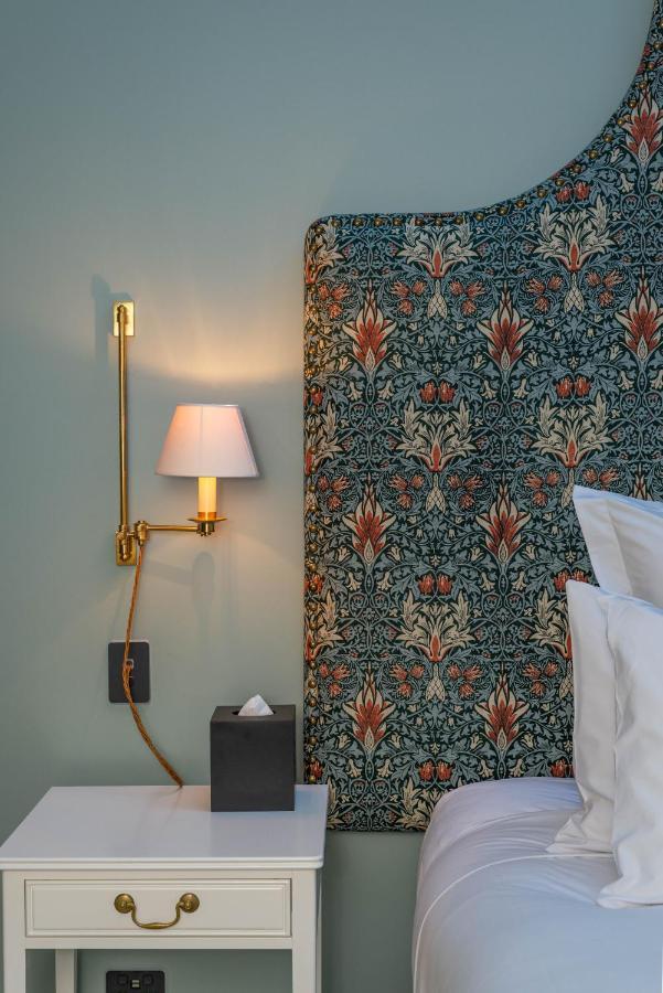 The Observatory Hotel Christchurch Exterior photo Curtain in the bedroom of a suite at the Hotel Axelmannstein