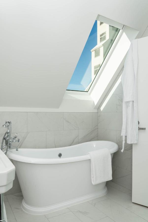 The Observatory Hotel Christchurch Exterior photo A fixed skylight in a bathroom